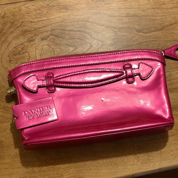 Danier Handbags - Danier Fuchsia Leather clutch